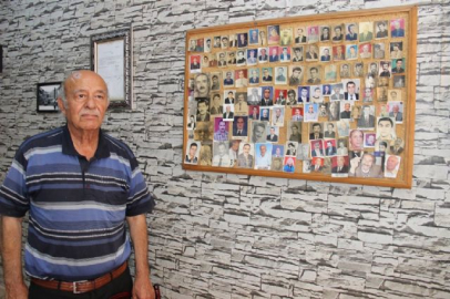 Ölen müşterilerinin fotoğraflarını iş yerinde sergiliyor